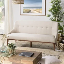 Canapé beige 2 places pieds en bois