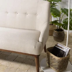 Canapé beige 2 places pieds en bois