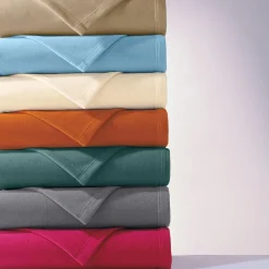 Couverture POLAIRE UNIE microfibre tempérée orange cuivré