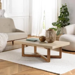 Table basse en béton beige pieds croisés en teck
