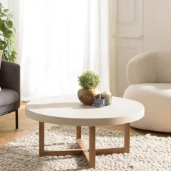 Table basse ronde en béton beige pieds croisés en teck DAK